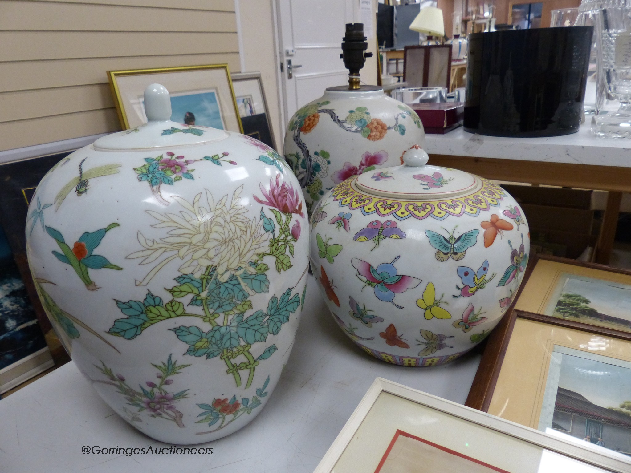 Two Chinese jars and covers and another converted to a lamp, tallest 22cm excl. light fitting